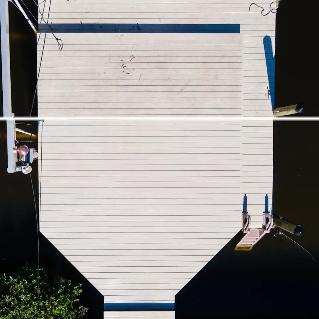 A clean white roof seen from straight above.